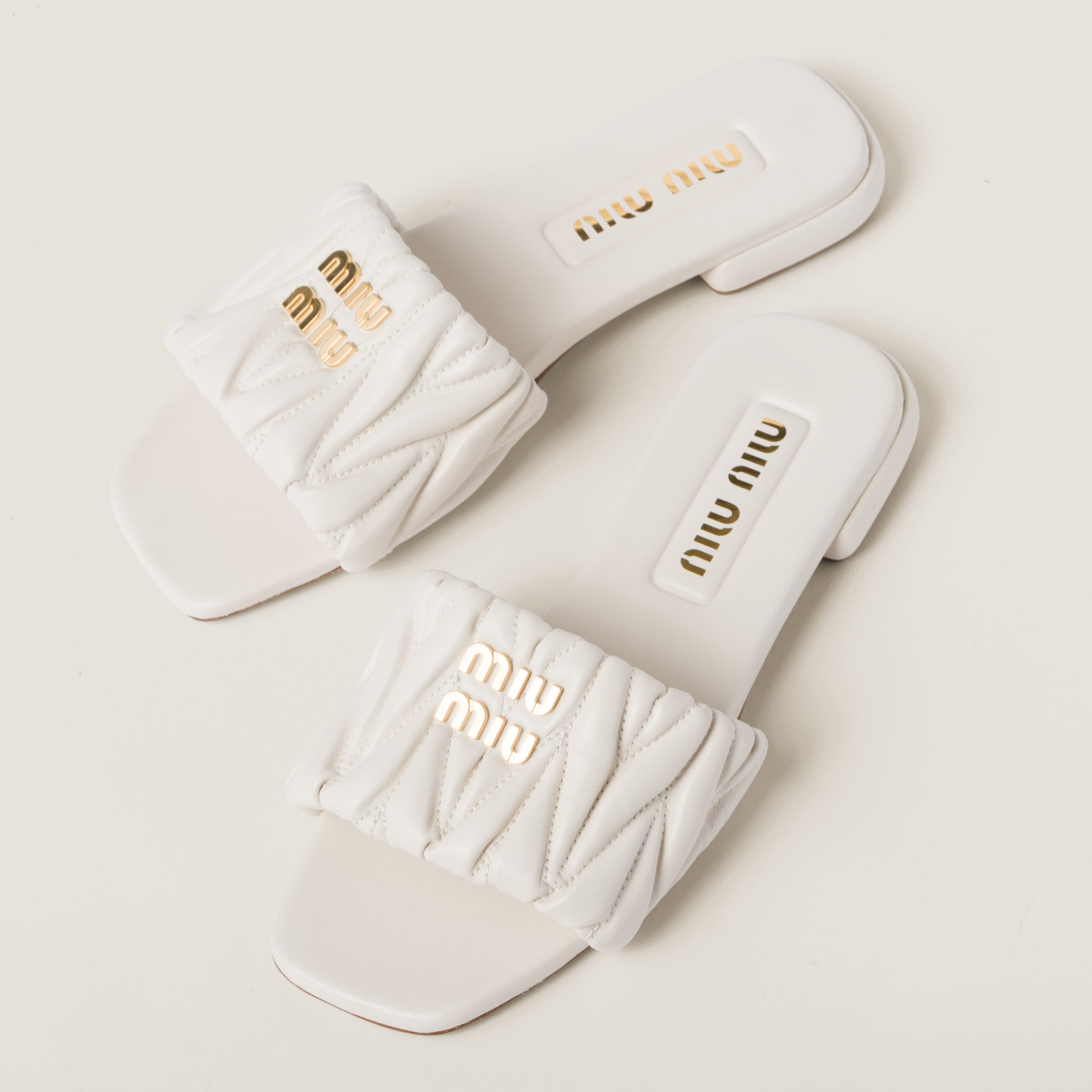 Miu Miu Matelassé Nappa Leather Slides In White