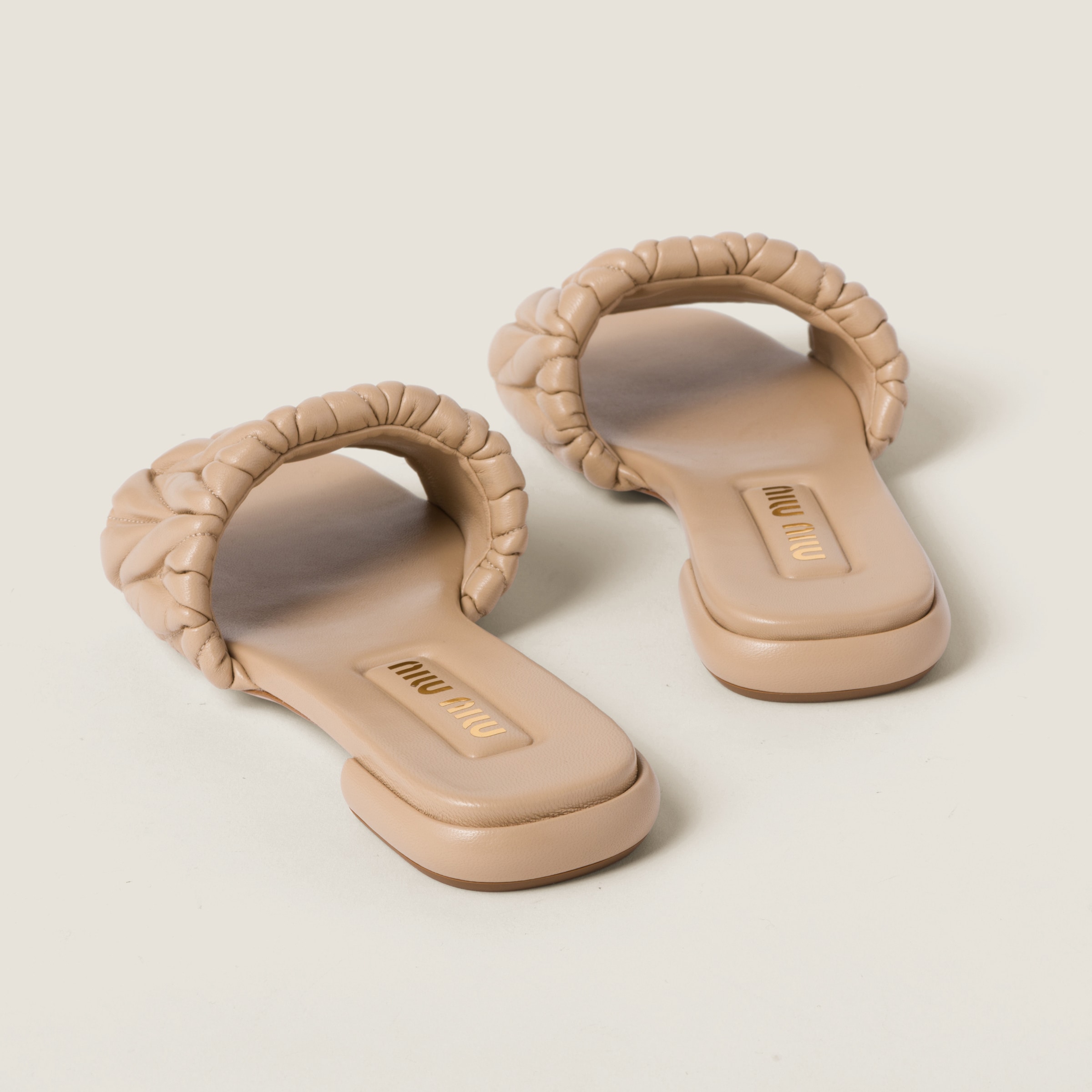 Sand Beige Matelassé Nappa Leather Slides | Miu Miu
