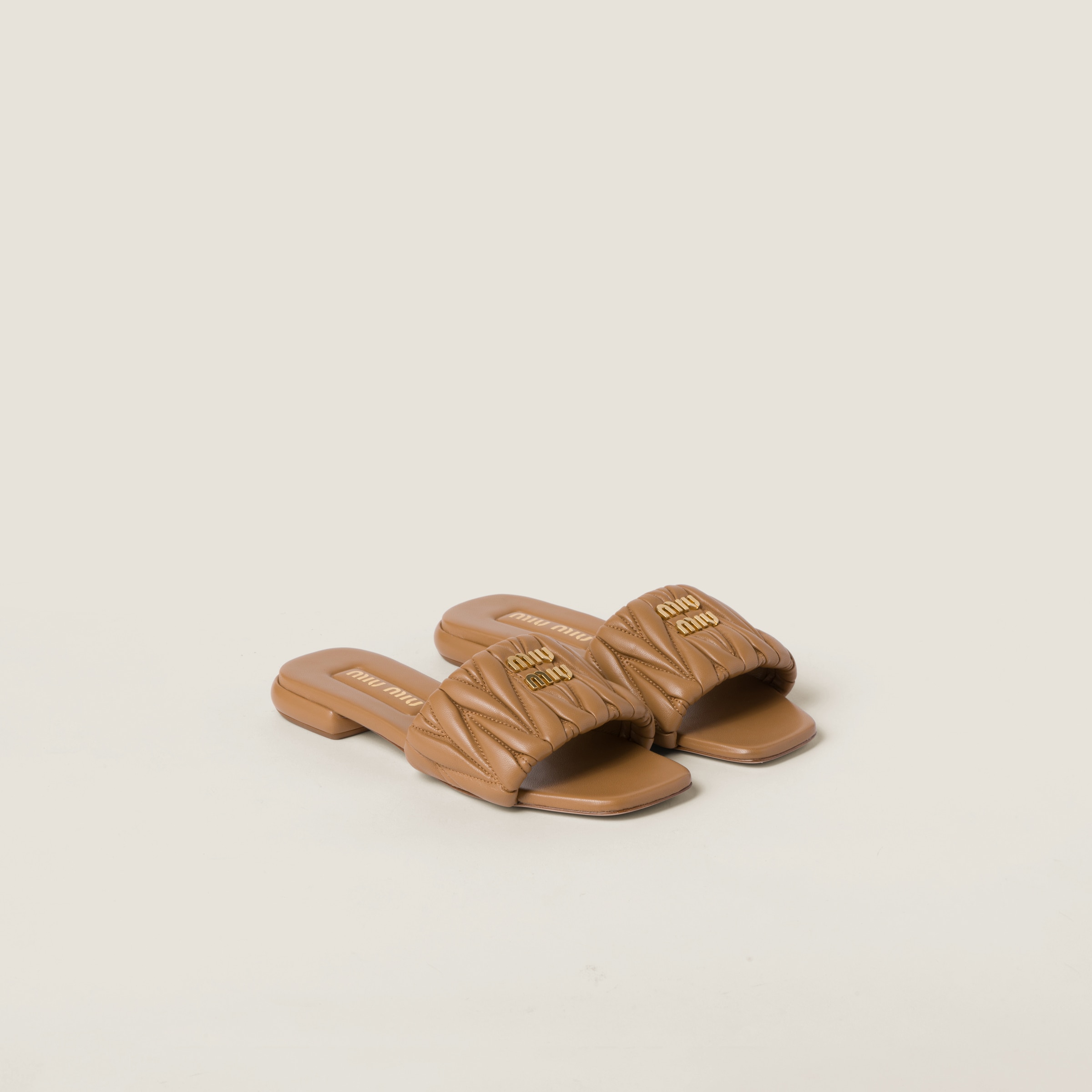 Miumiu Matelassé Nappa Leather Slides In Caramel