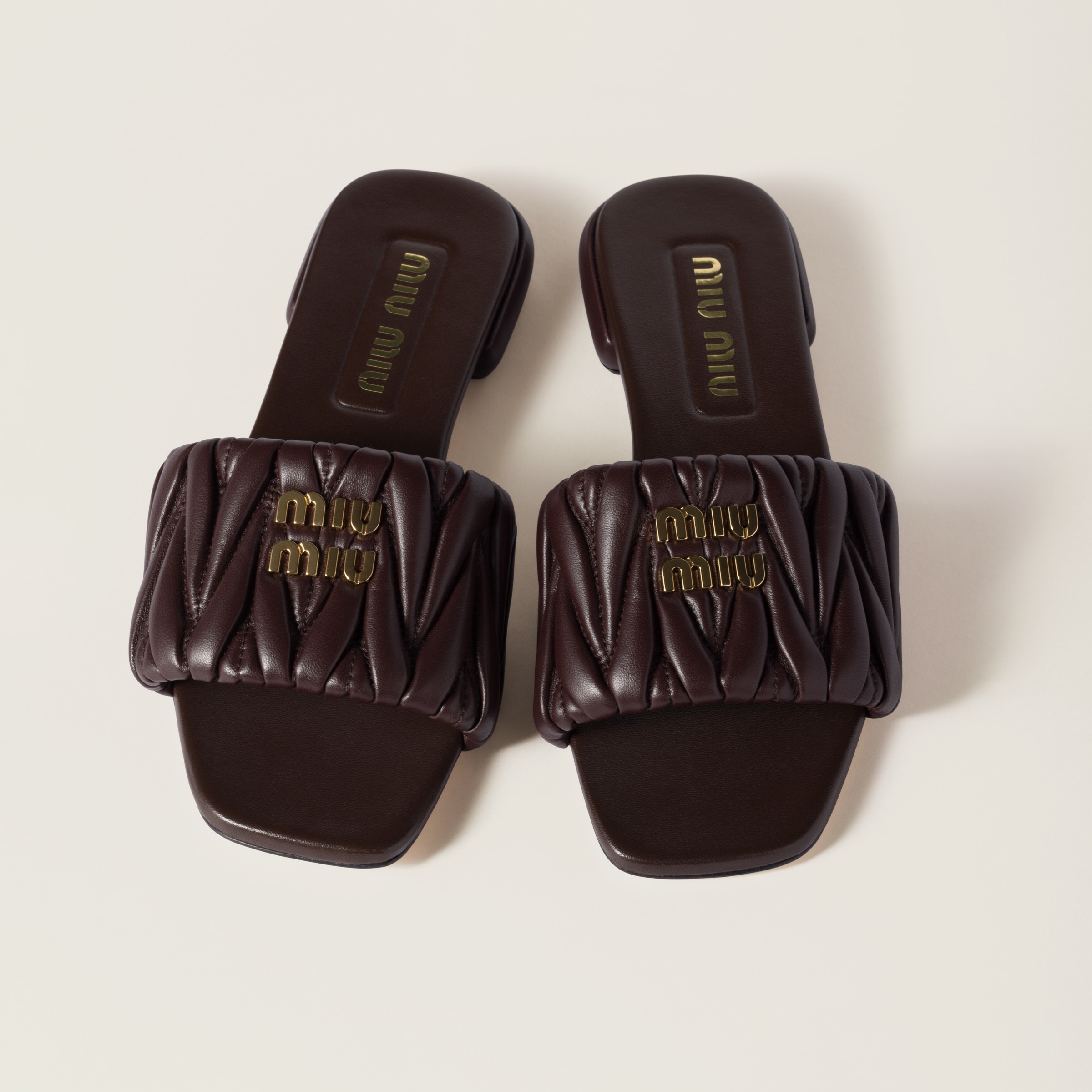 MIU MIU MATELASSÉ NAPPA LEATHER SLIDES