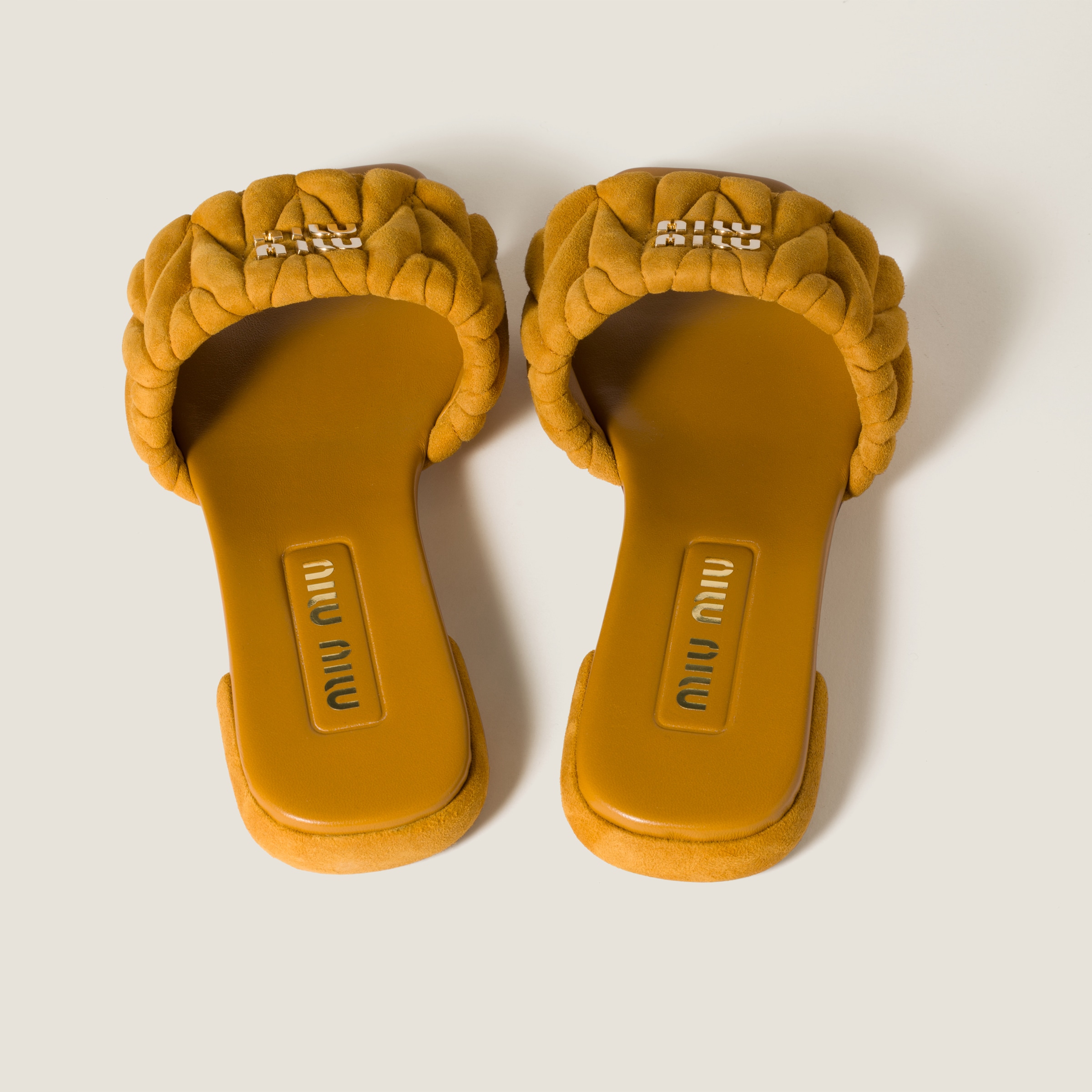 MIU MIU MATELASSÉ SUEDE SLIDES