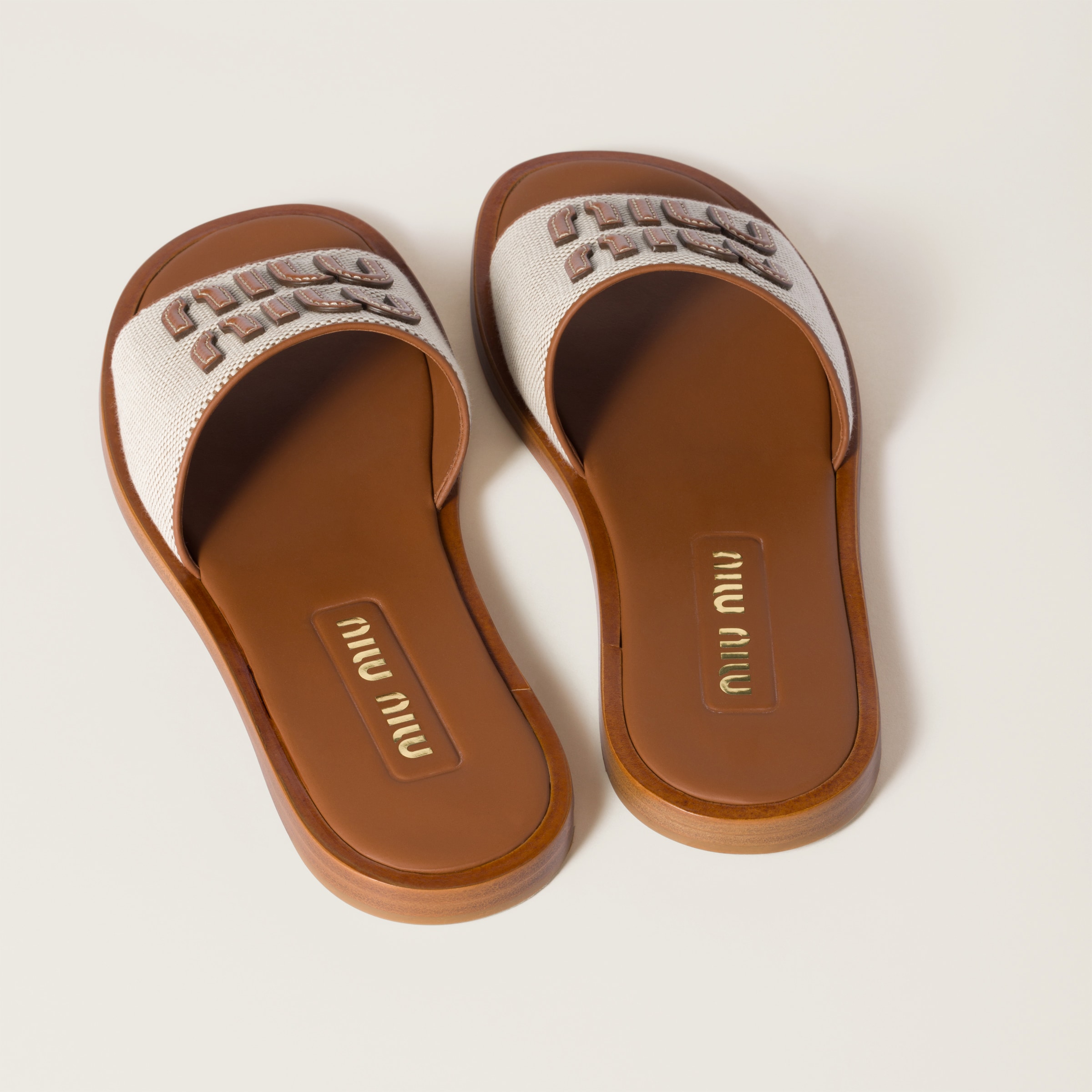 MIU MIU CANVAS AND LEATHER SLIDES
