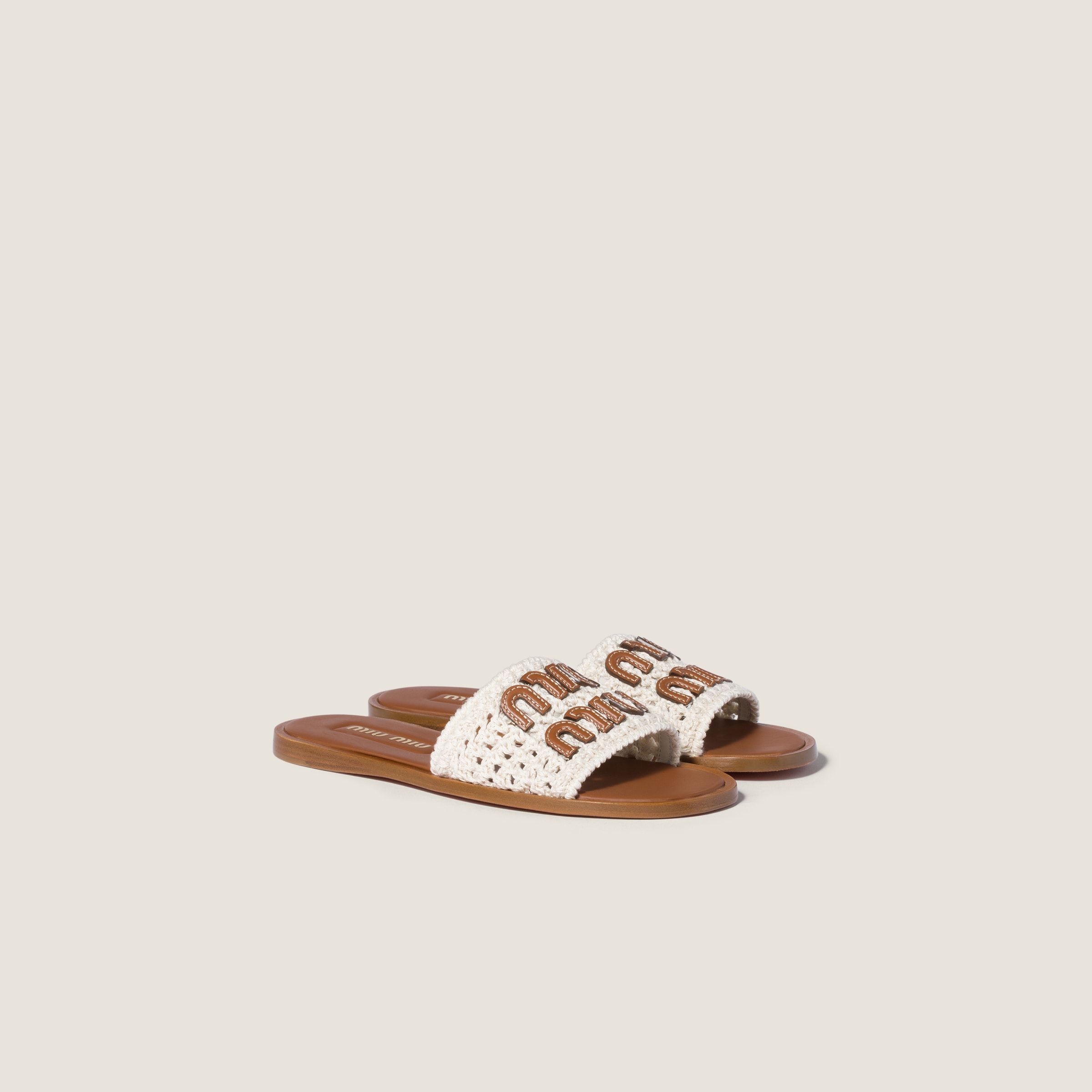 Crochet and leather slides from Miu Miu - $1,120