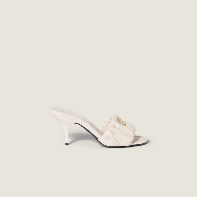 Matelassé patent nappa leather mules