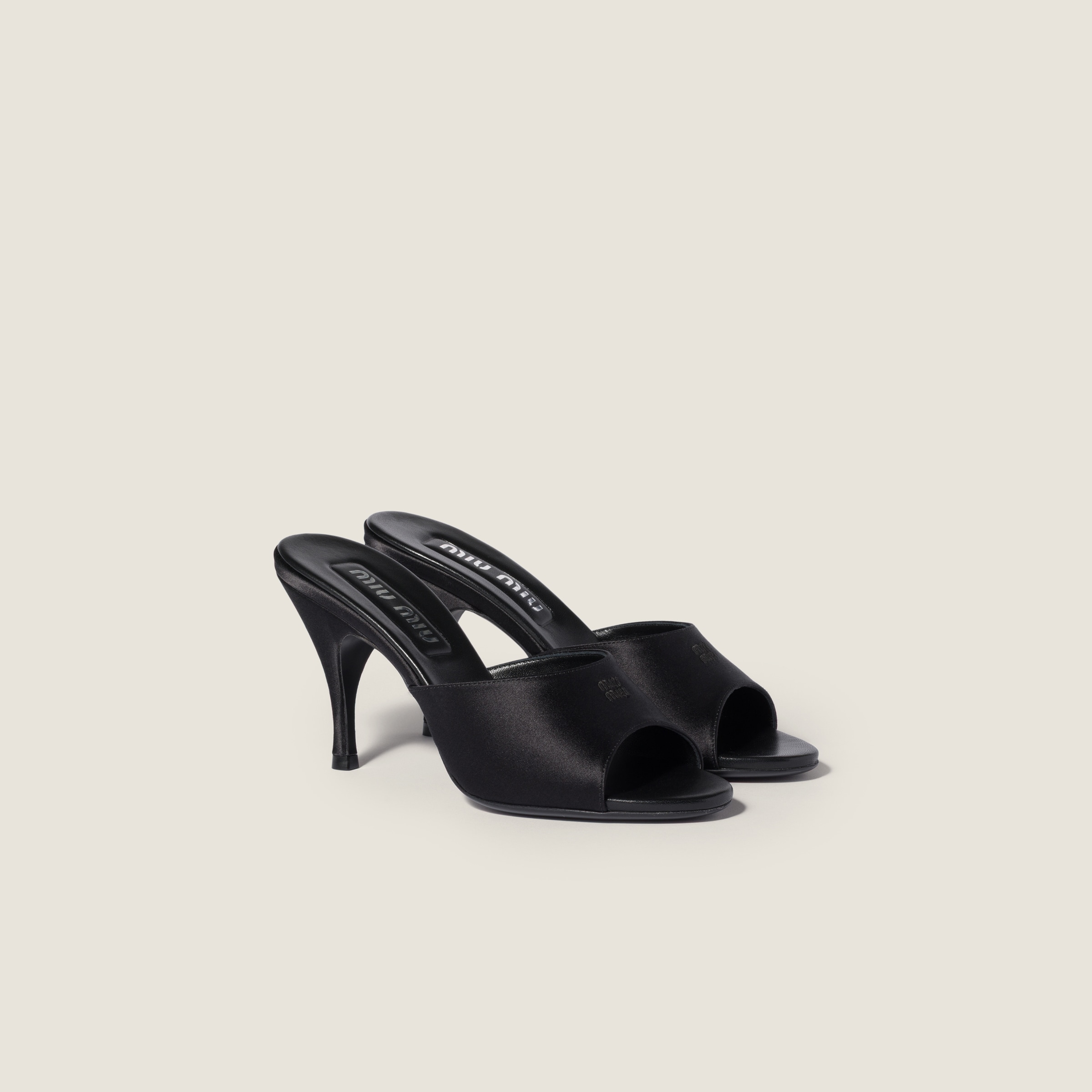 Satin sandals from Miu Miu - $1,170