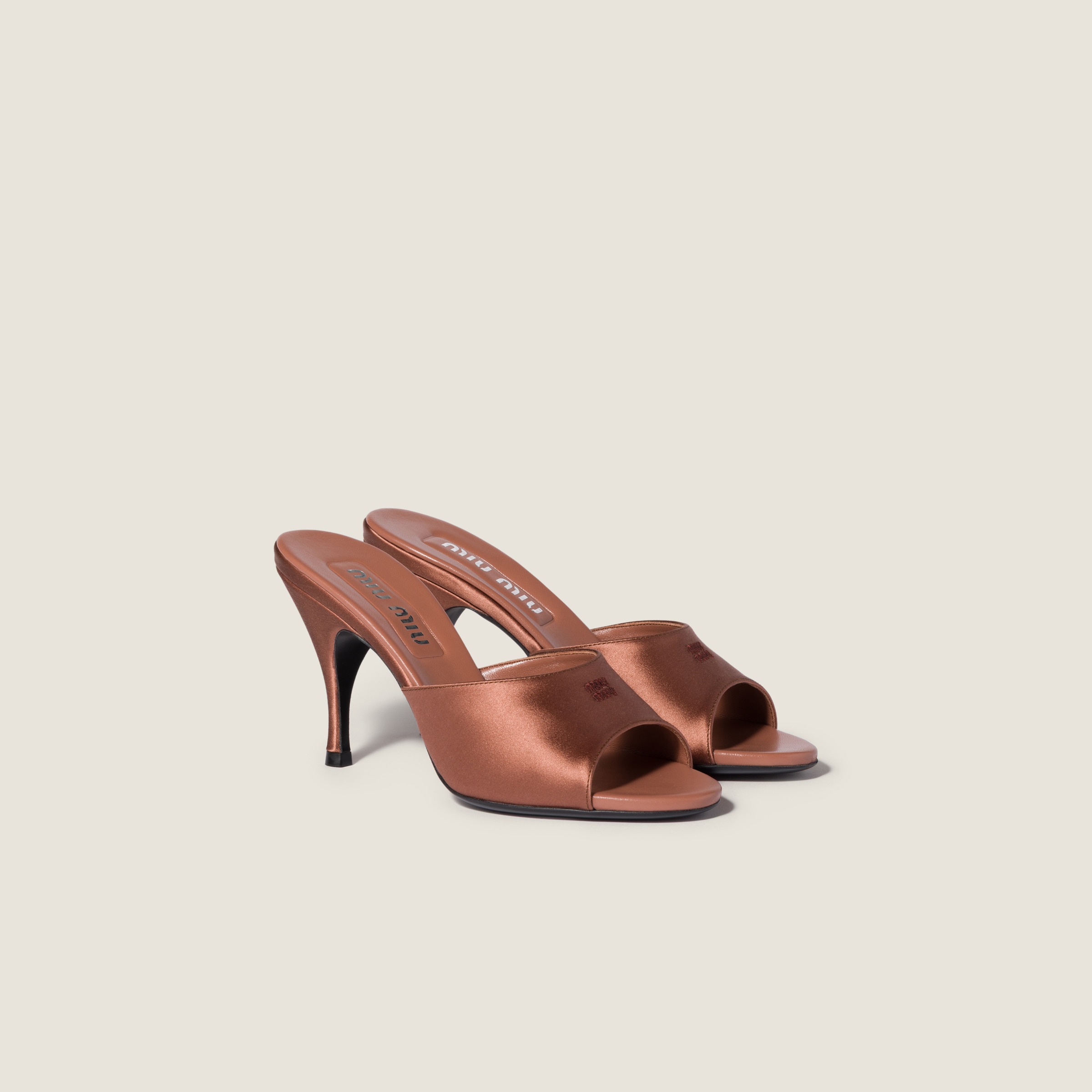 Satin sandals from Miu Miu - $1,170