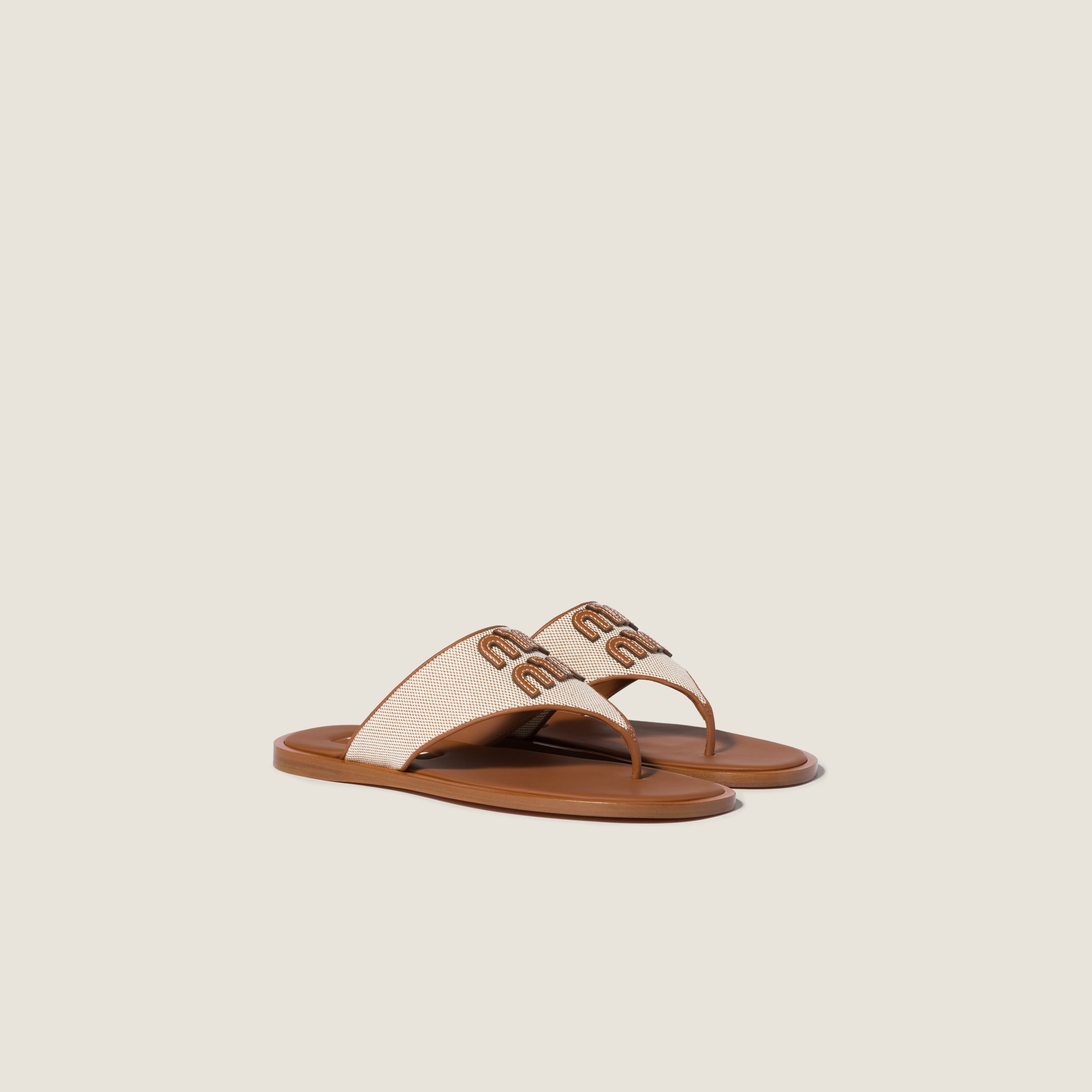 Canvas and leather thong sandals from Miu Miu - $1,020