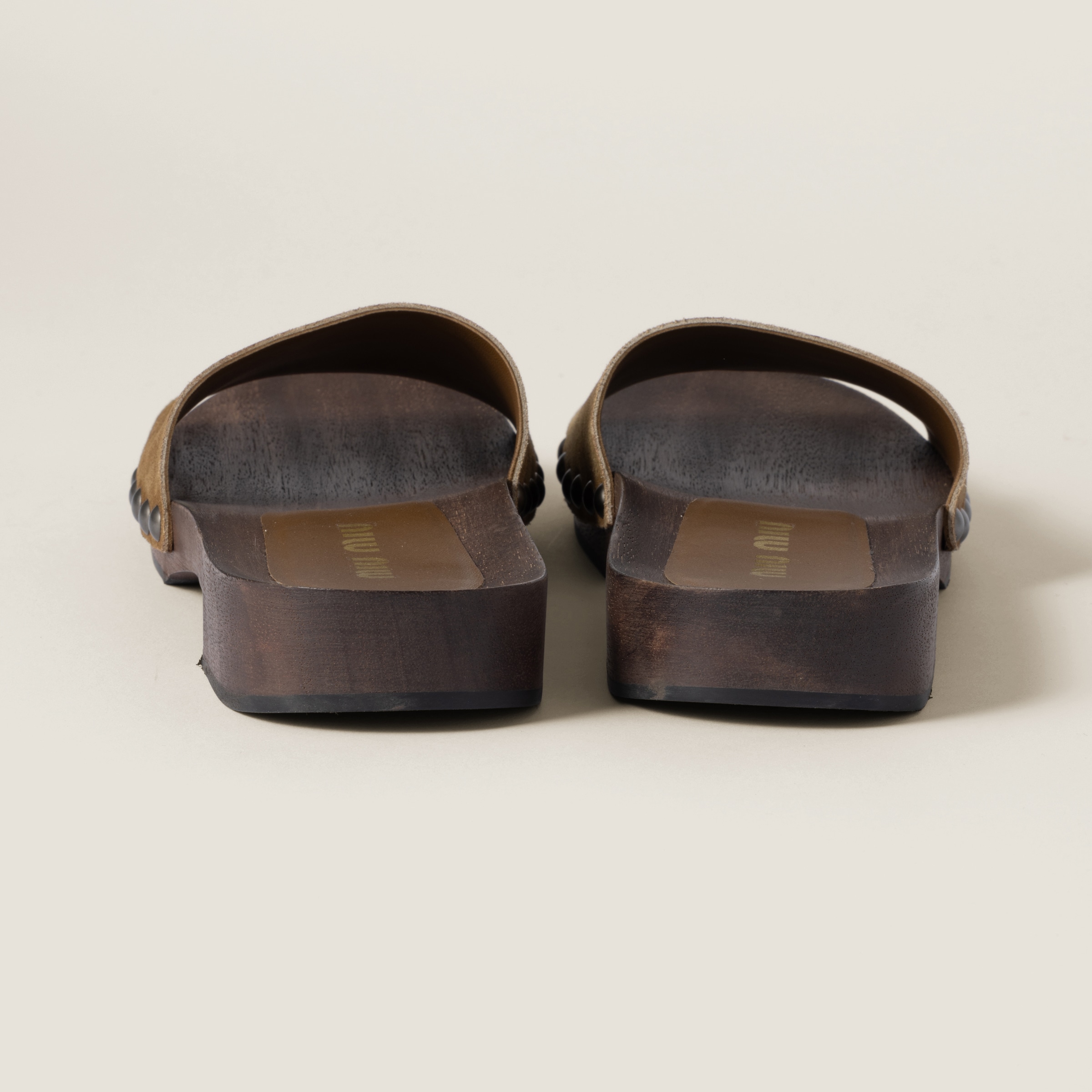 Miu Miu Distressed Suede Clogs Featuring Studded Detail In Cinnamon