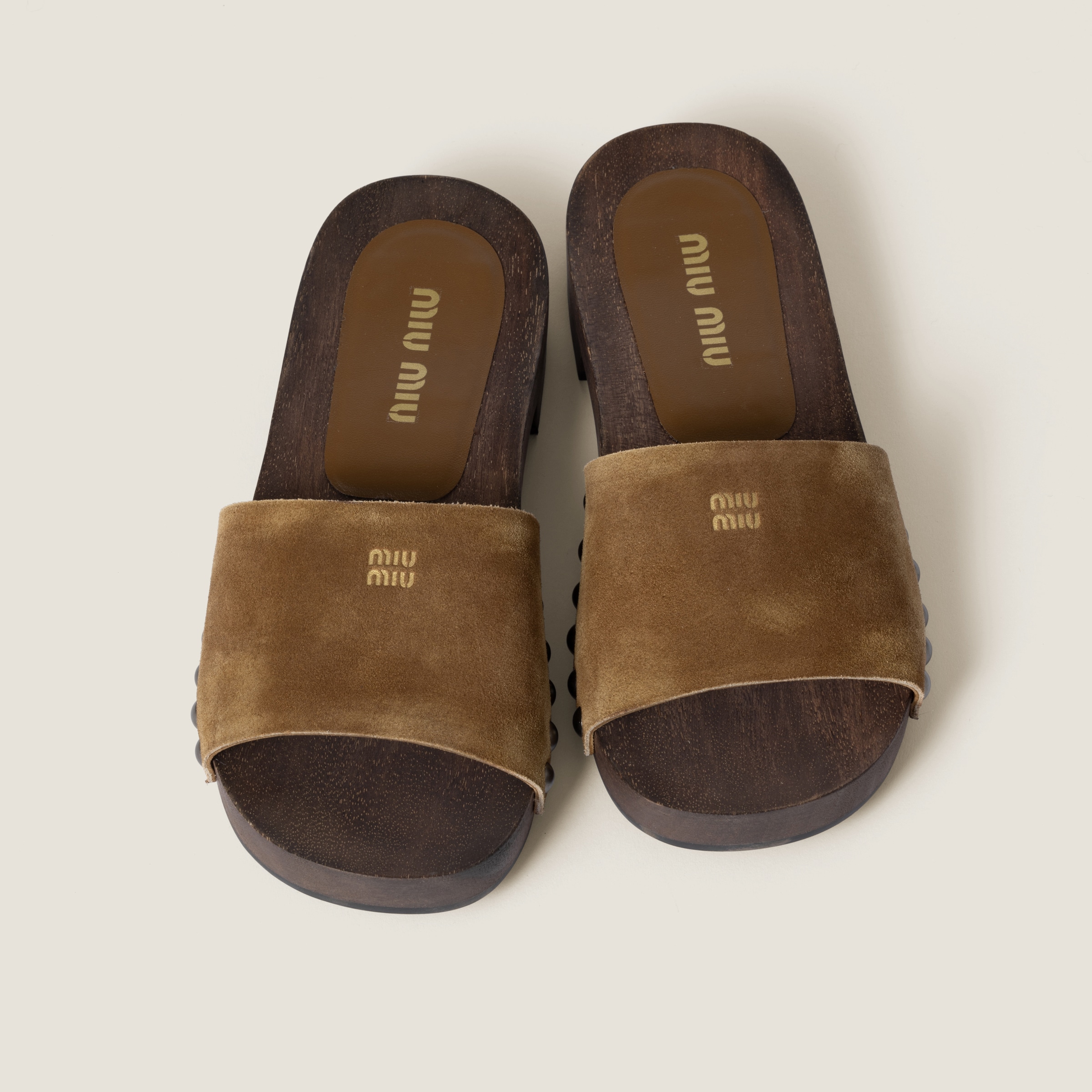 Miu Miu Distressed Suede Clogs Featuring Studded Detail In Cinnamon