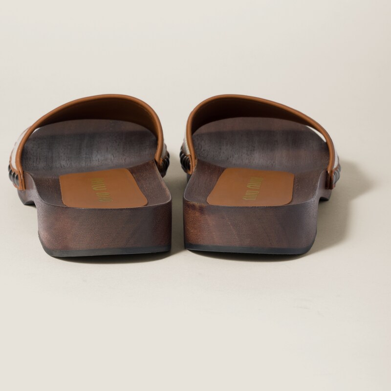 Canvas and leather clogs