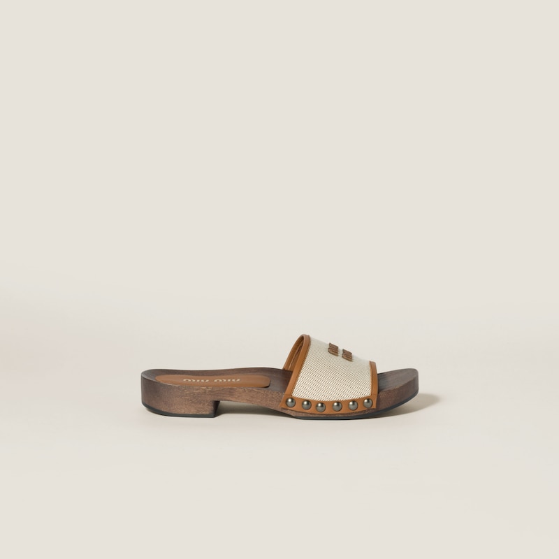 Canvas and leather clogs