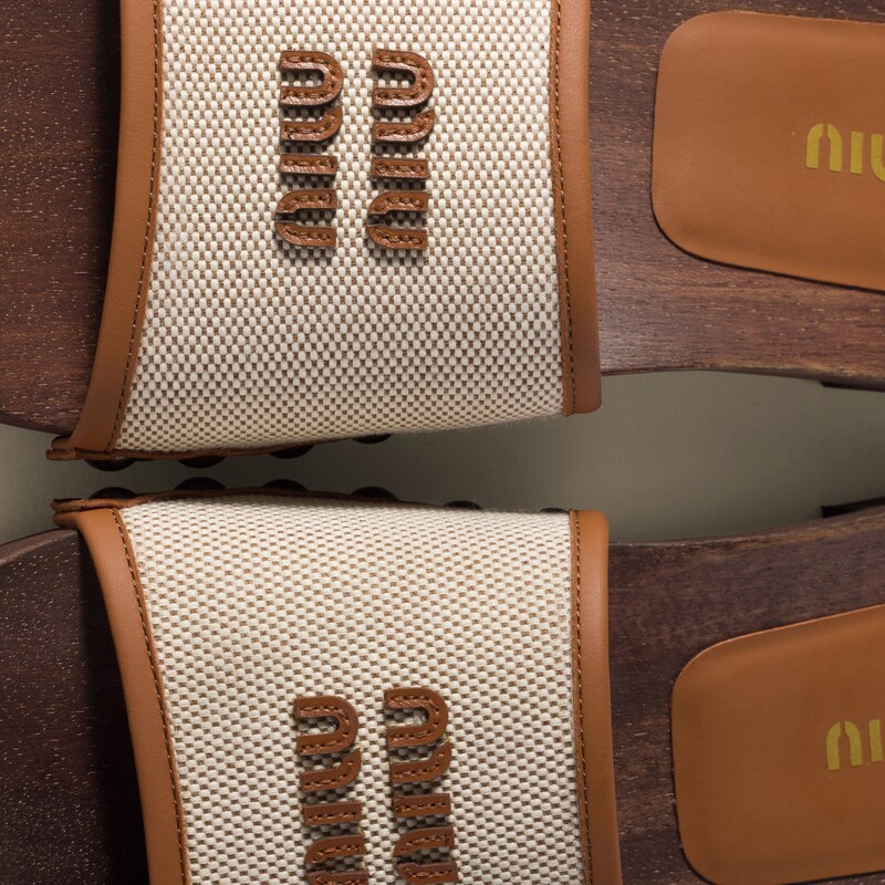 Canvas and leather clogs