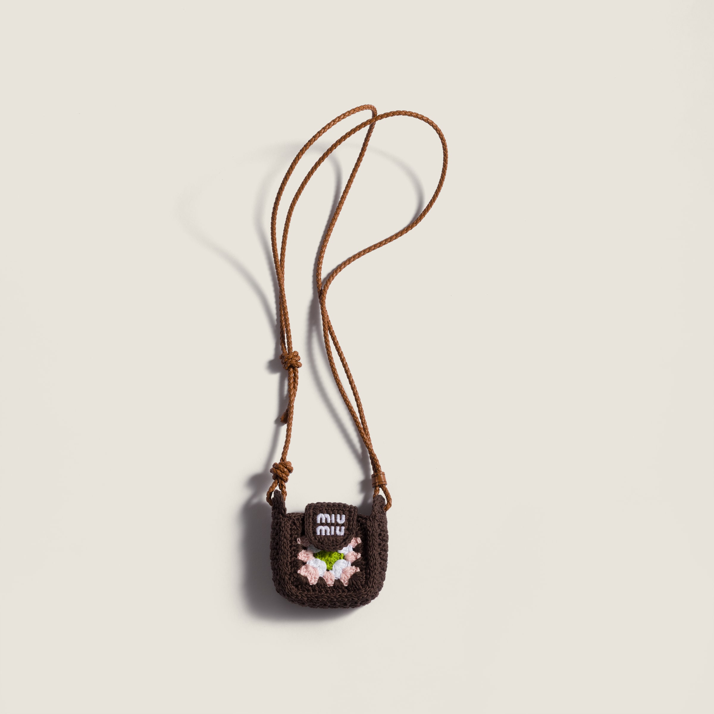Crochet earbud pouch from Miu Miu - $795