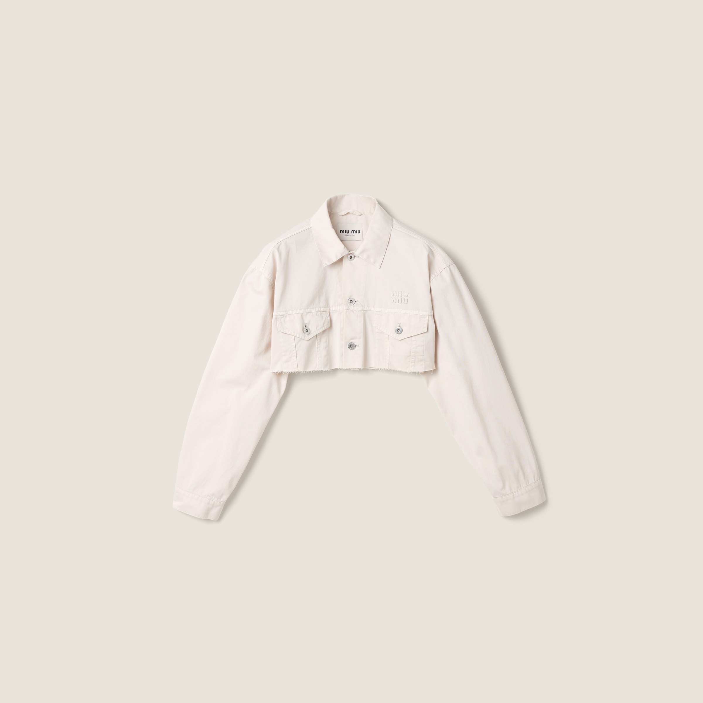 Cropped white denim jacket from Miu Miu - $1,990
