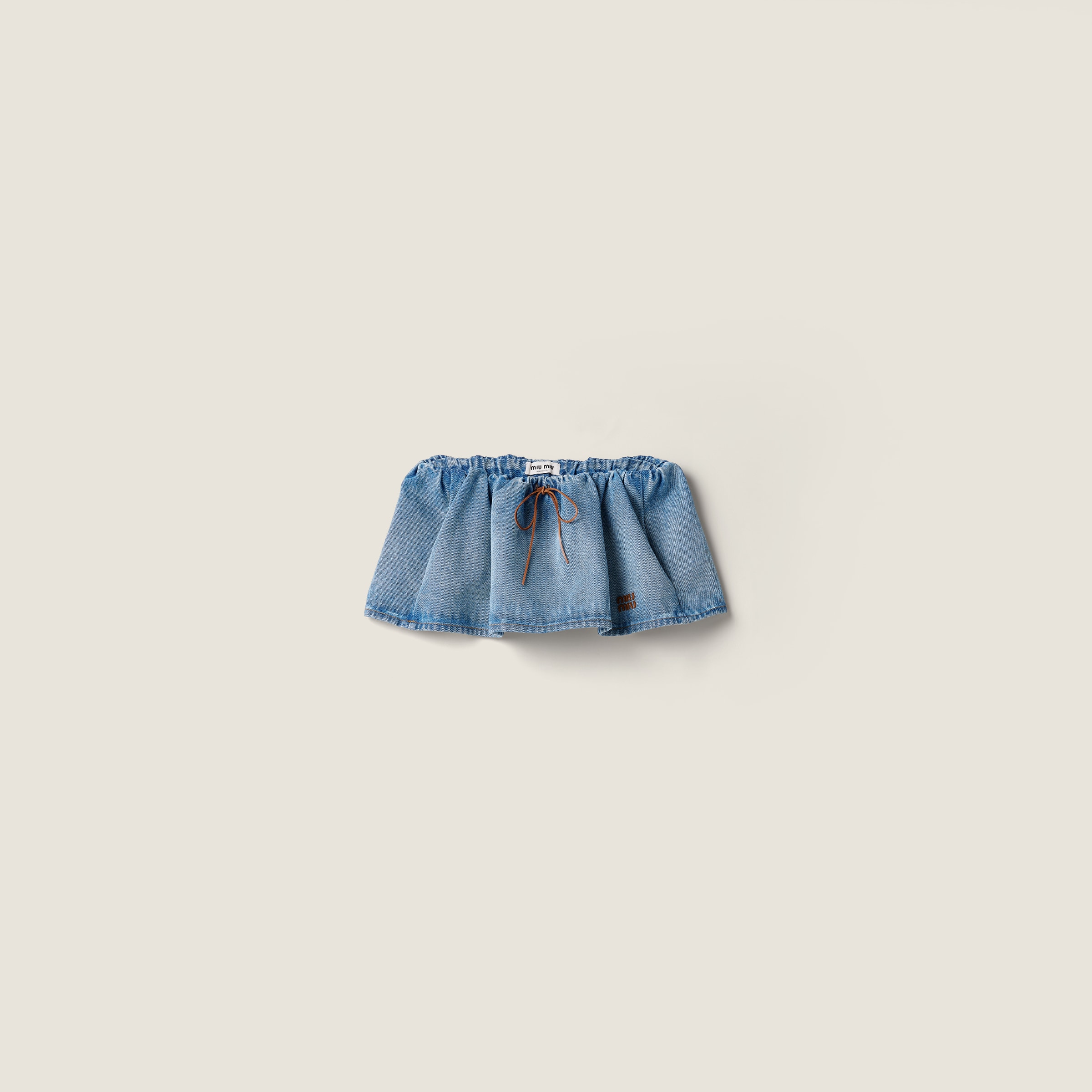 Washed denim miniskirt from Miu Miu - $1,550