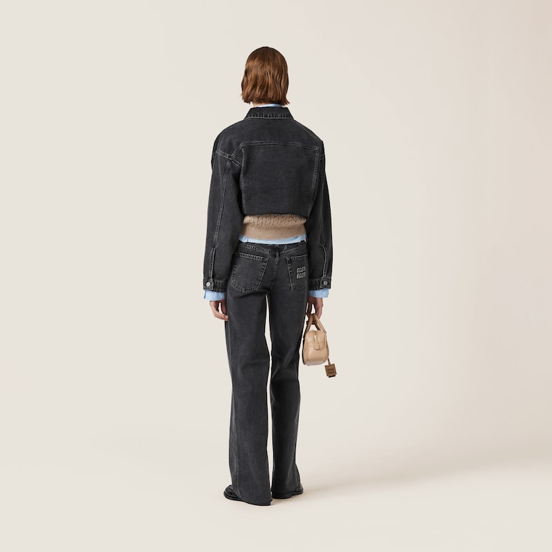 Five-pocket black denim jeans