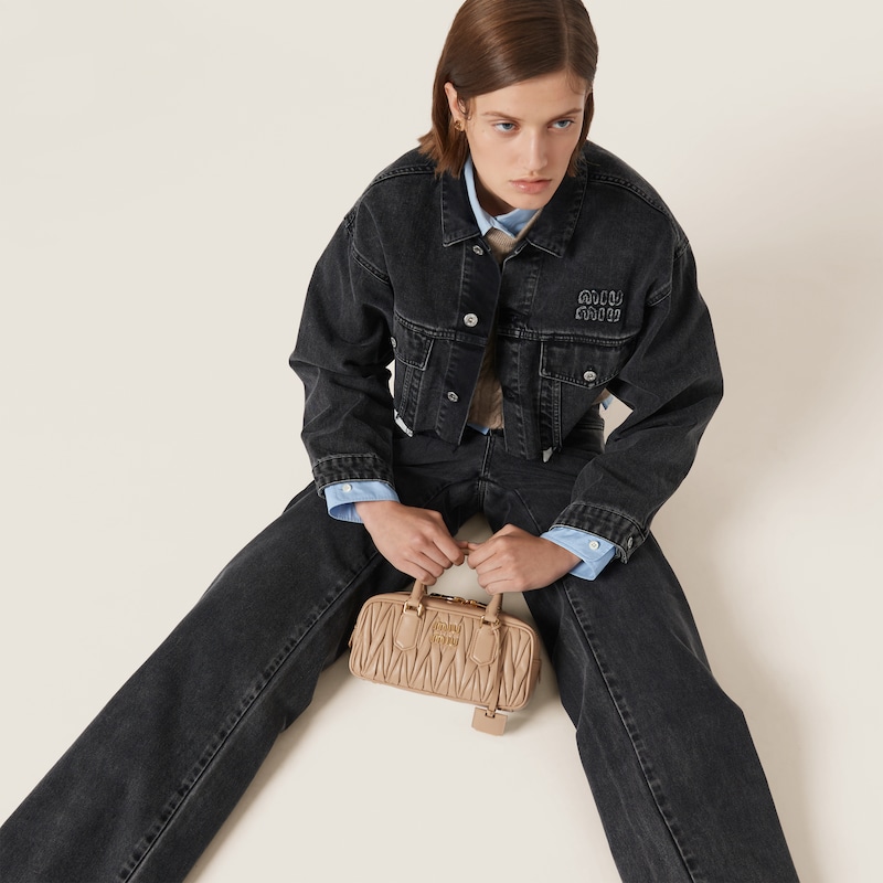 Five-pocket black denim jeans