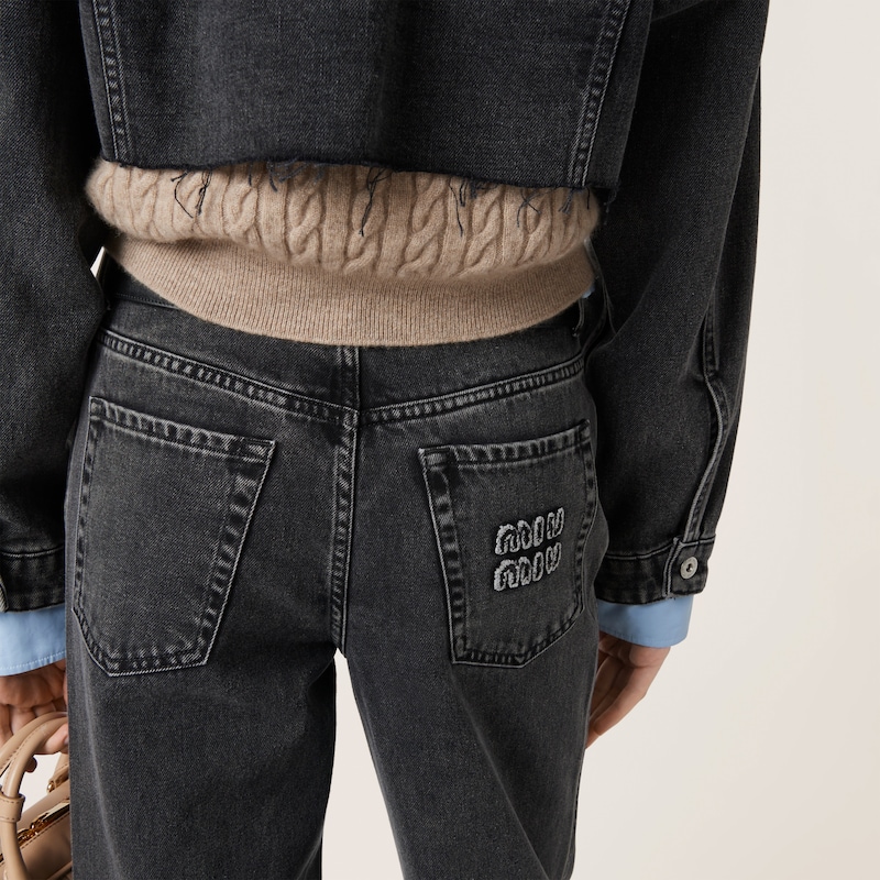 Five-pocket black denim jeans