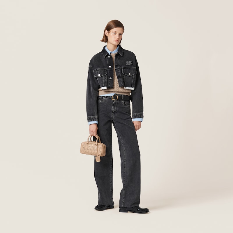 Five-pocket black denim jeans