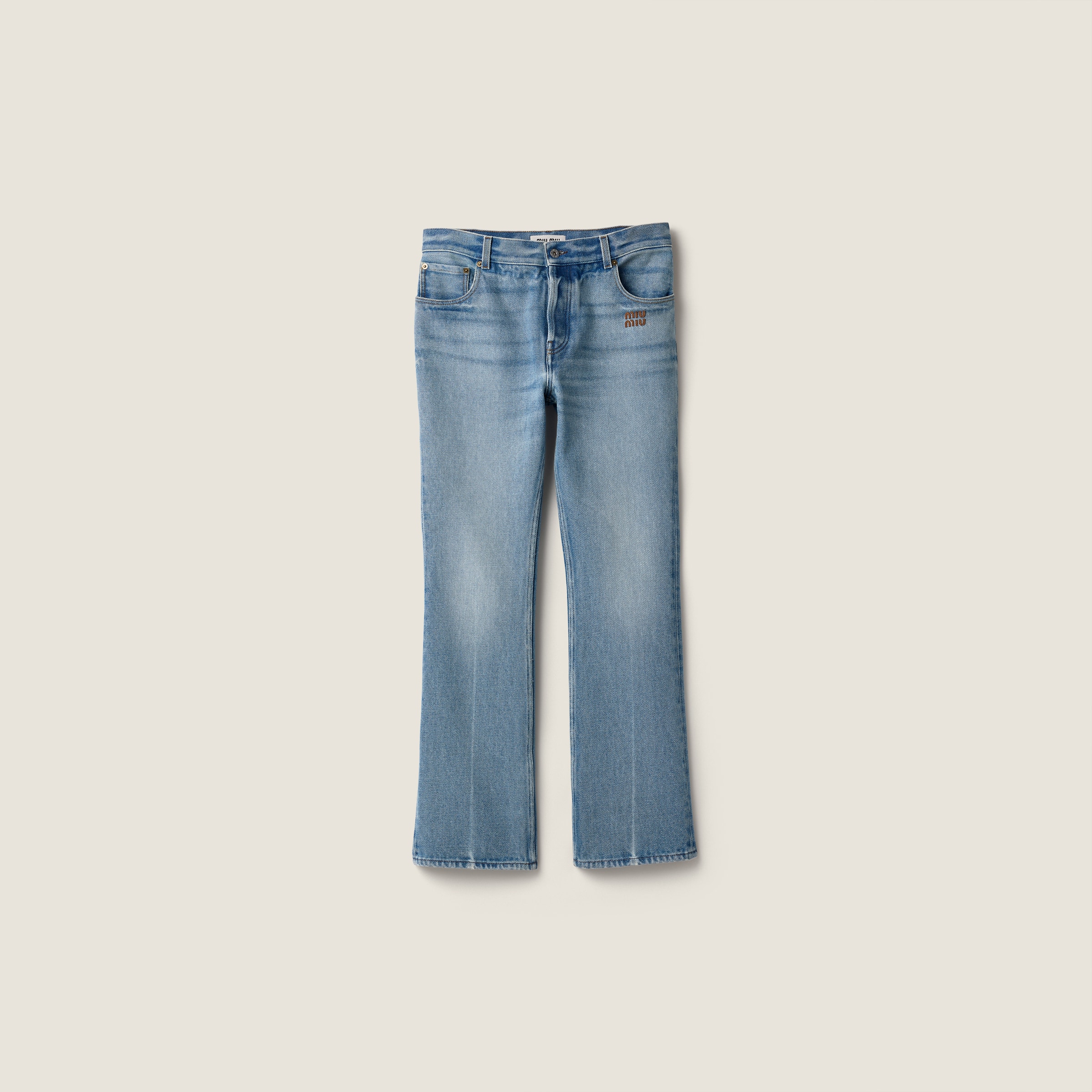 Five-pocket washed denim jeans from Miu Miu - $1,790