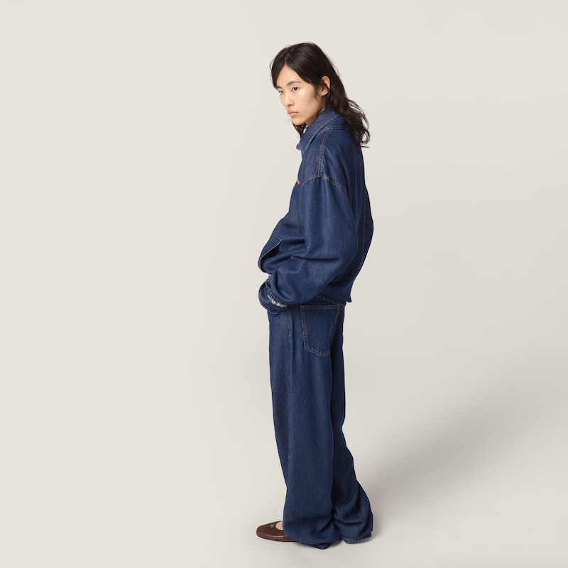 Five-pocket washed denim jeans