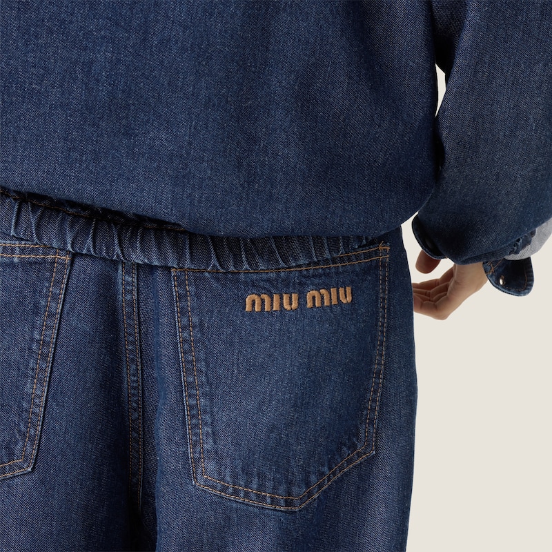 Five-pocket washed denim jeans