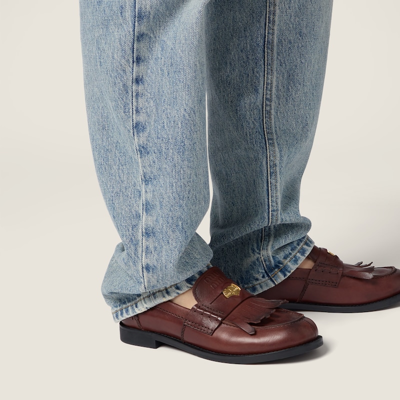 Five-pocket washed denim jeans