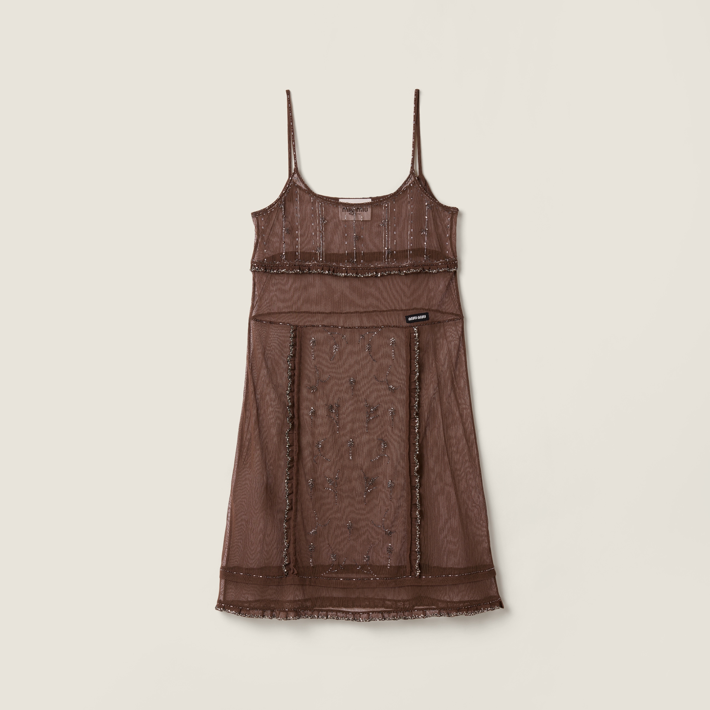Embellished tulle dress from Miu Miu - $12,000