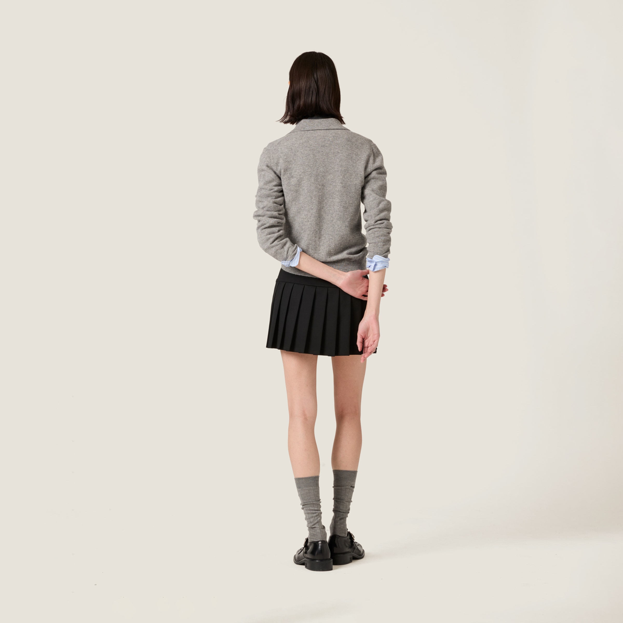 MIU MIU GRAIN DE POUDRE WOOL MINISKIRT