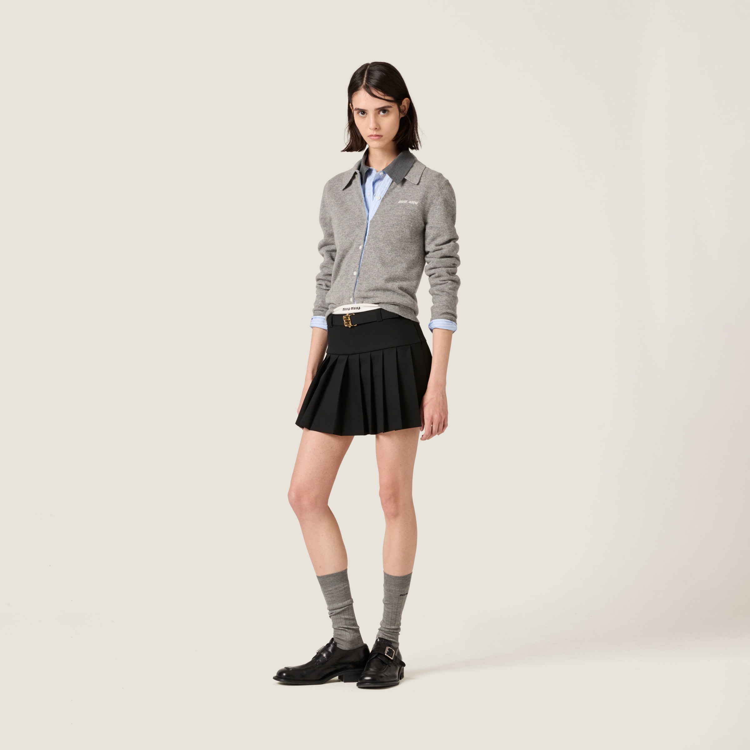 MIU MIU GRAIN DE POUDRE WOOL MINISKIRT