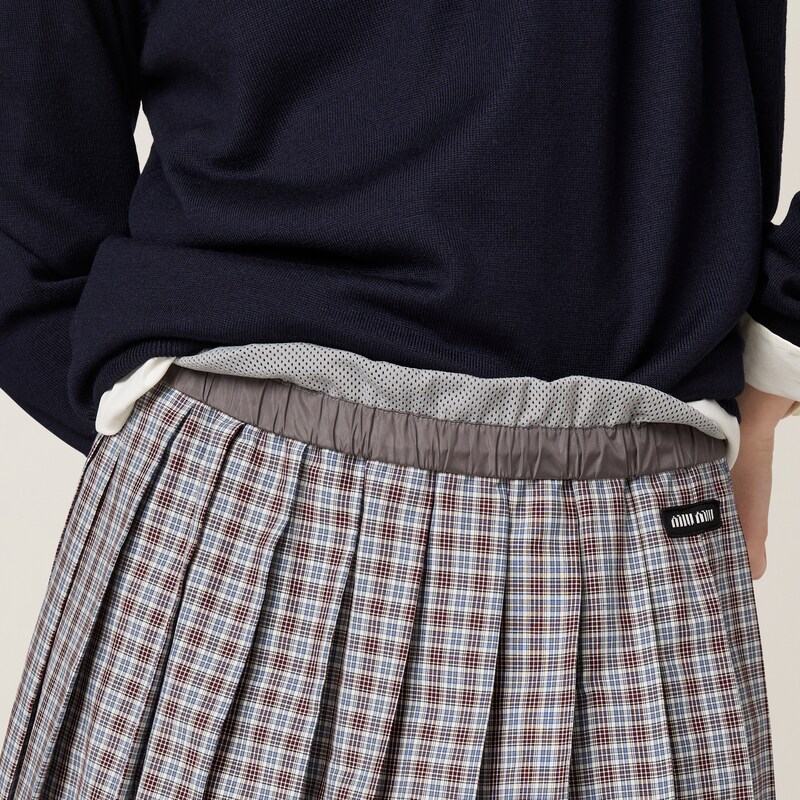 Pleated check skirt