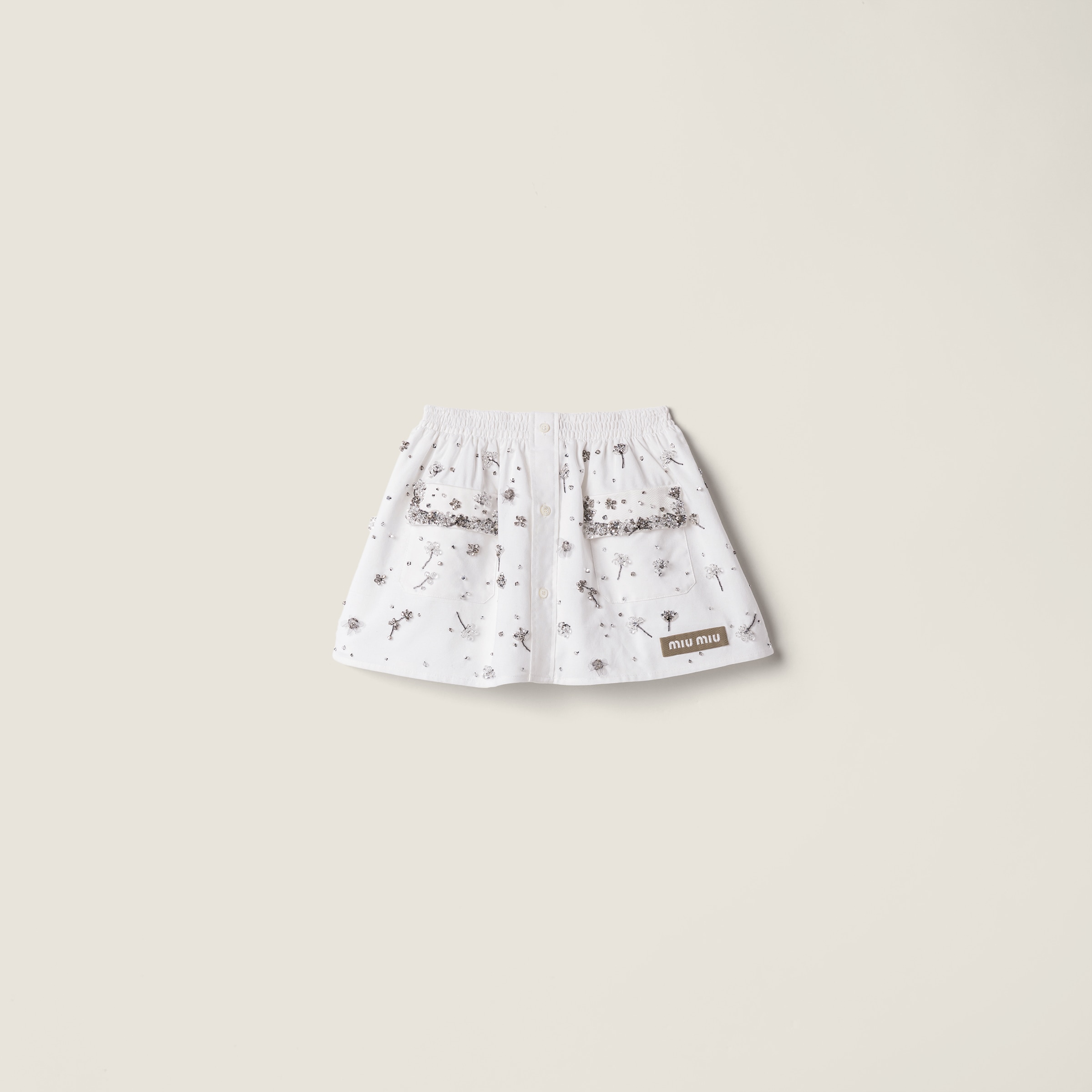 Embroidered poplin miniskirt from Miu Miu - $7,500