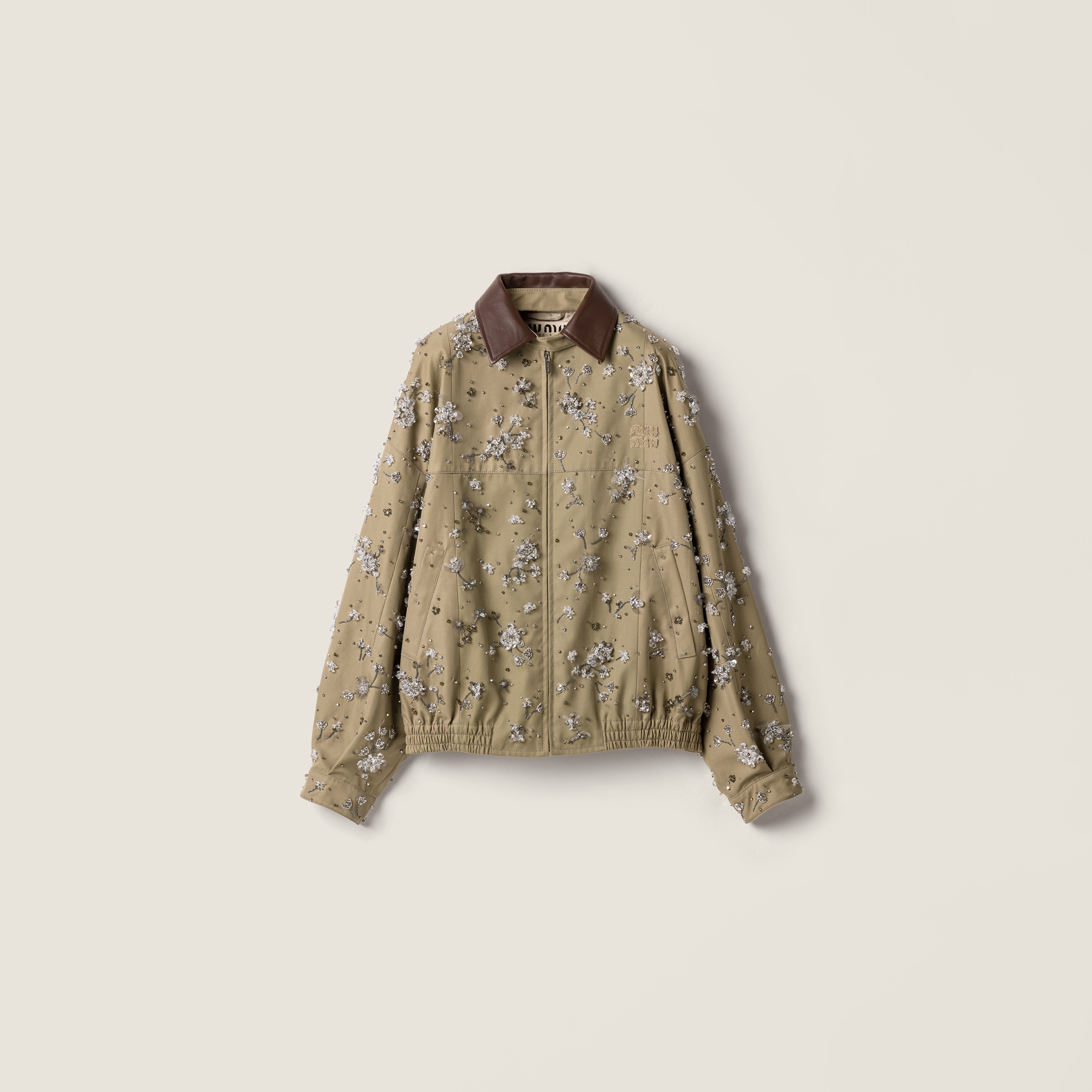 Embroidered chino and leather blouson jacket from Miu Miu - $16,500