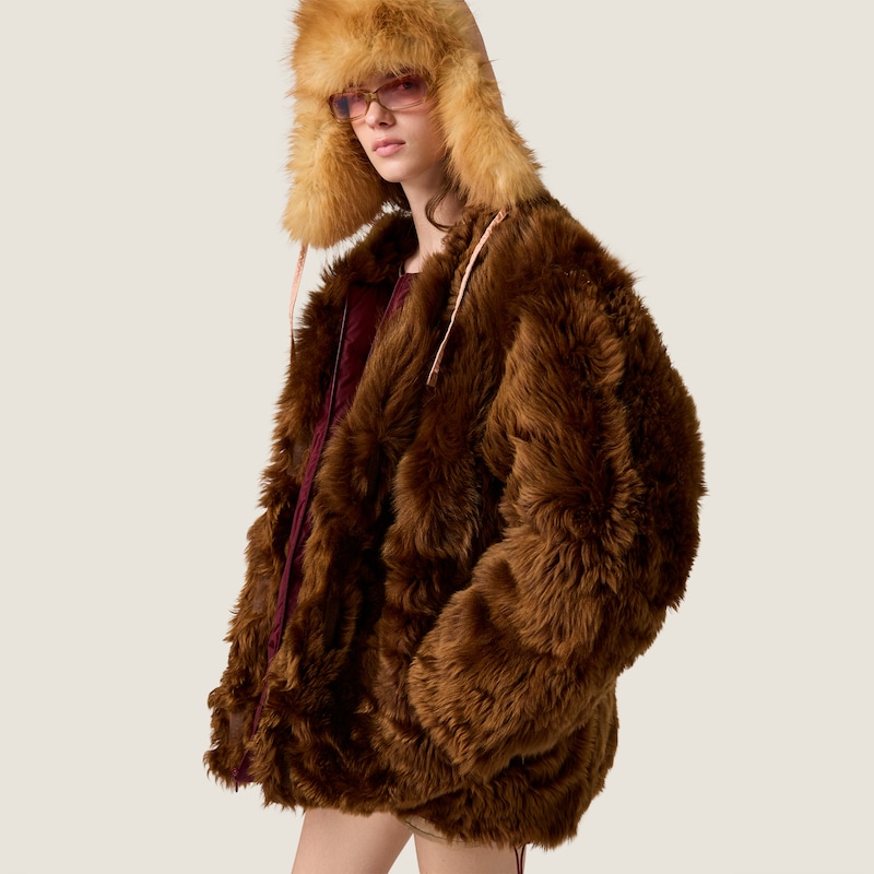 Reversible technical fabric and shearling down jacket