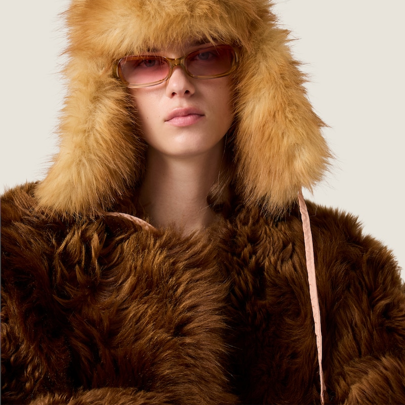 Reversible technical fabric and shearling down jacket
