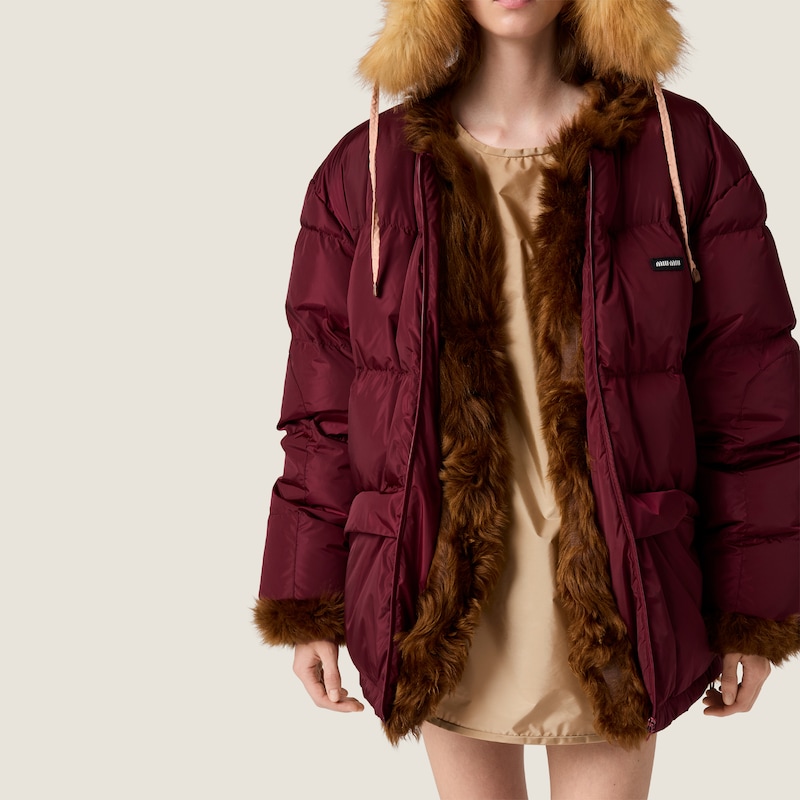 Reversible technical fabric and shearling down jacket