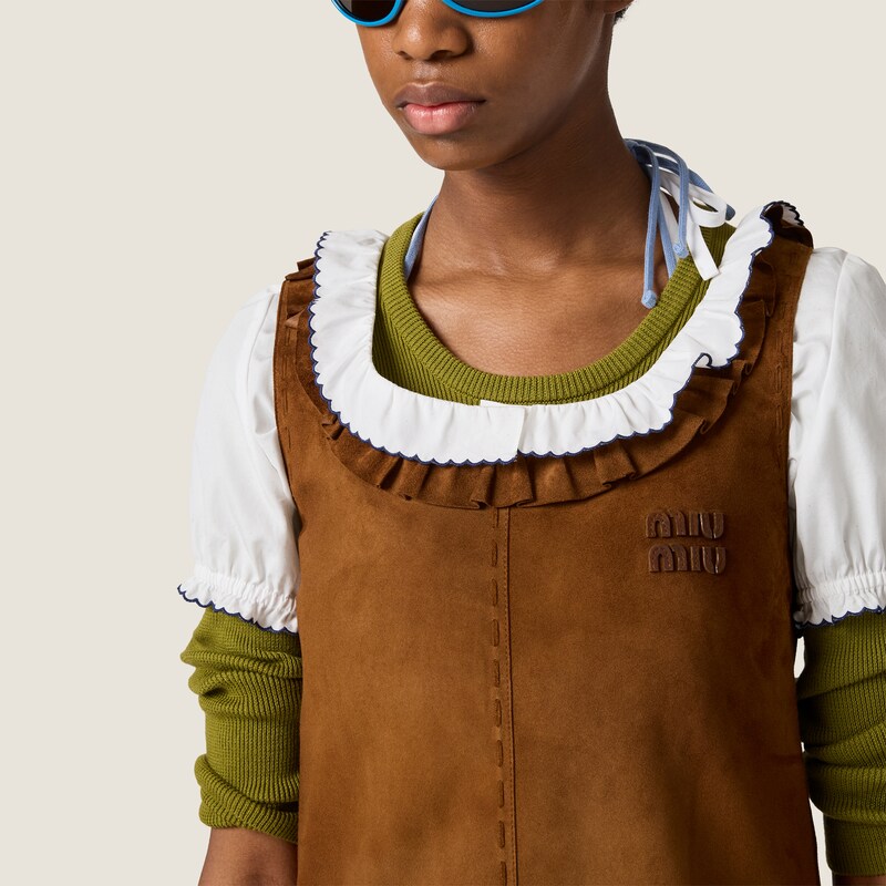 فستان من جلد السويدي المشمّع