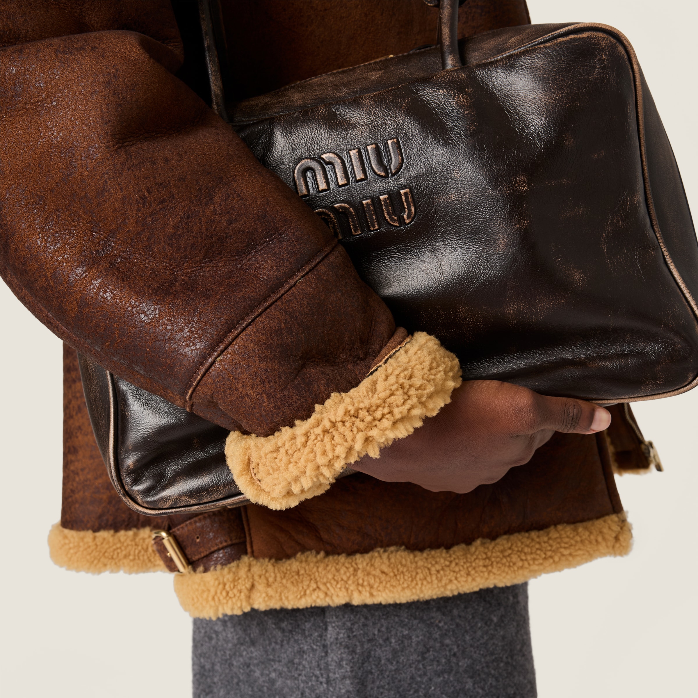 Miu Miu Waxed Shearling Blouson Jacket In Brown