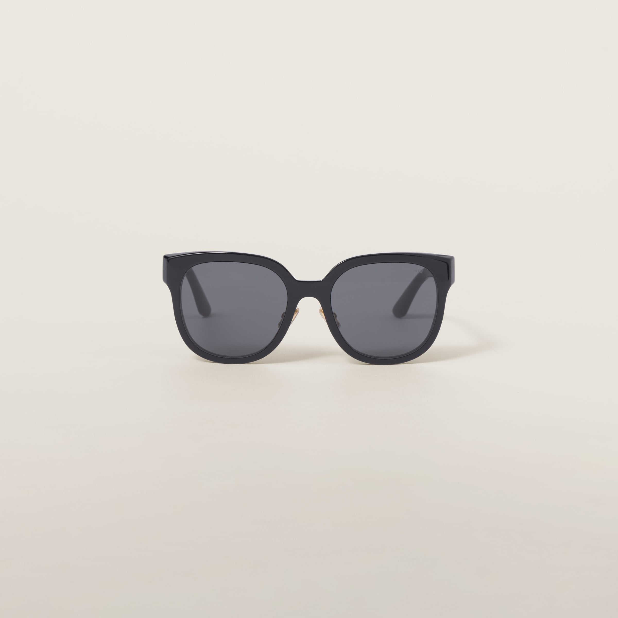 Miu Miu Logo Sunglasses In Slate Gray Lenses