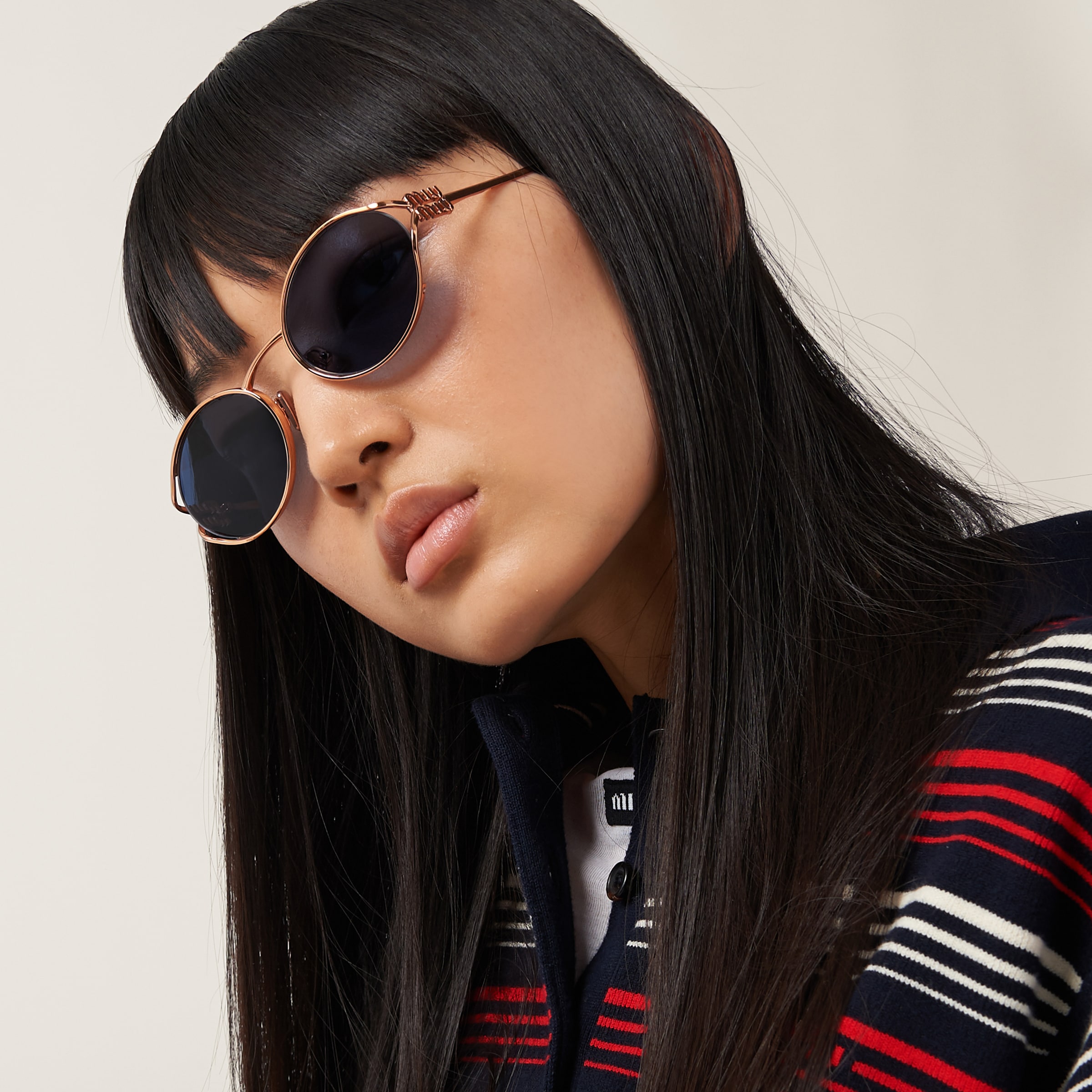 Miu miu logo best sale sunglasses