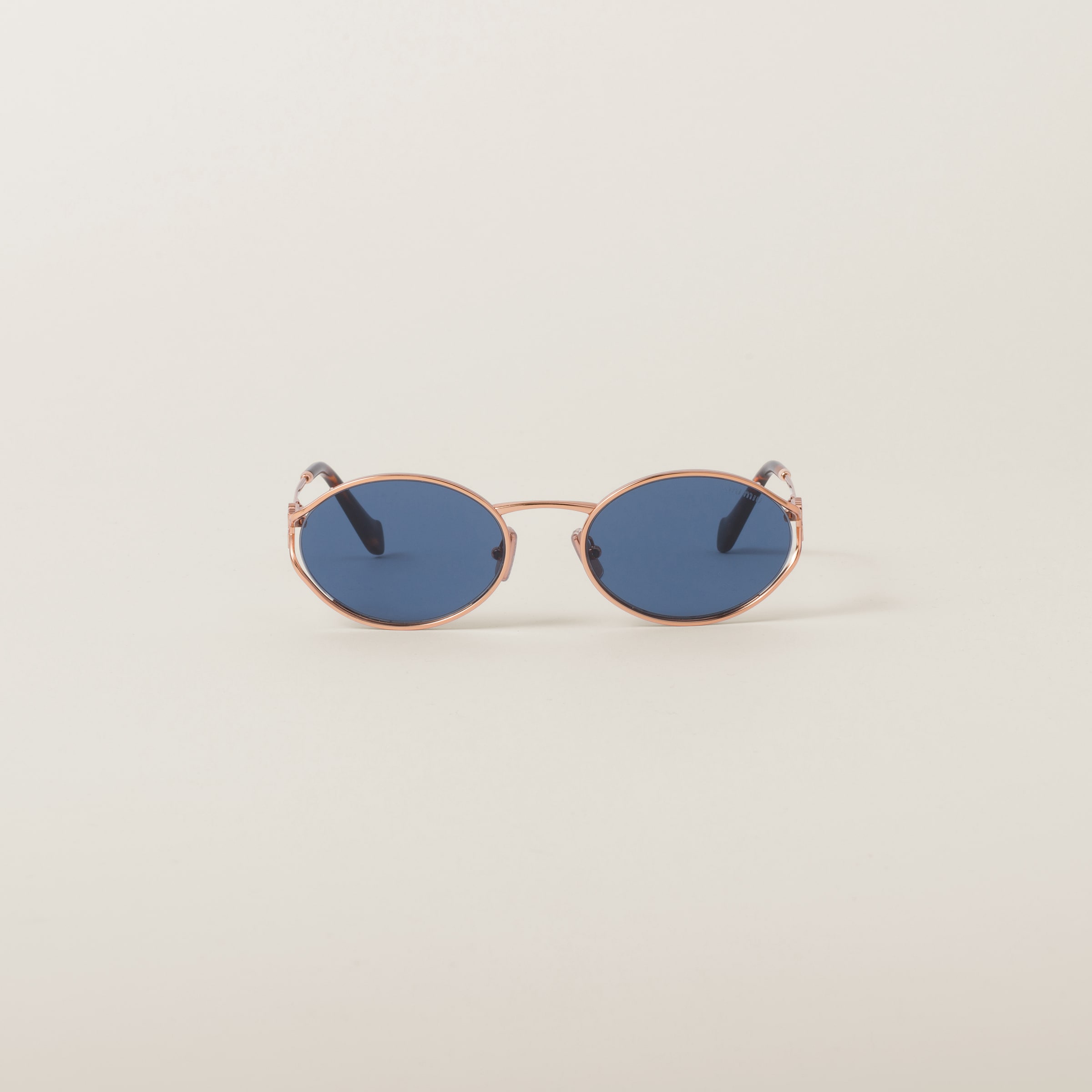 Miu Miu Logo Sunglasses In Blue Lenses