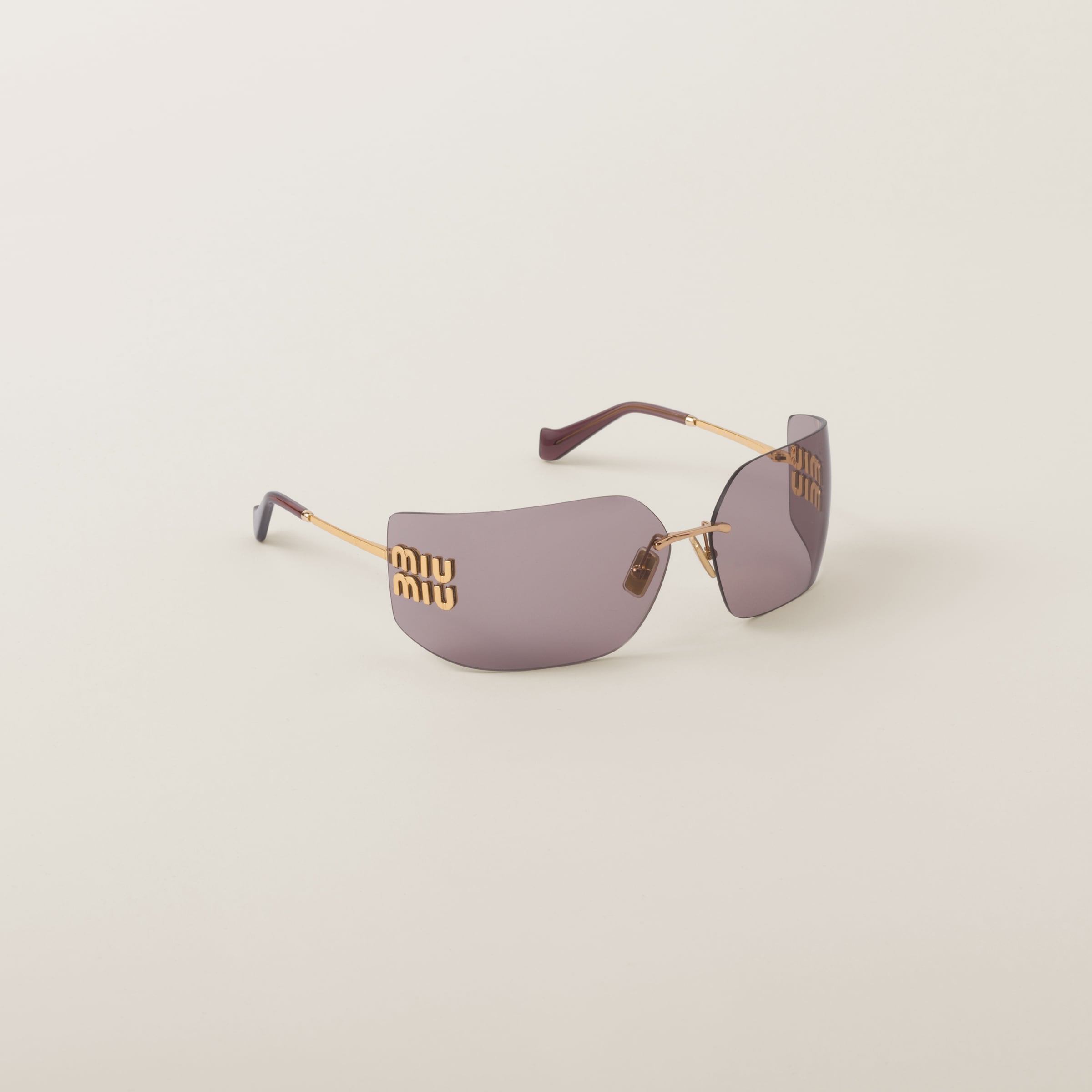 Miu miu hot sale rimless sunglasses