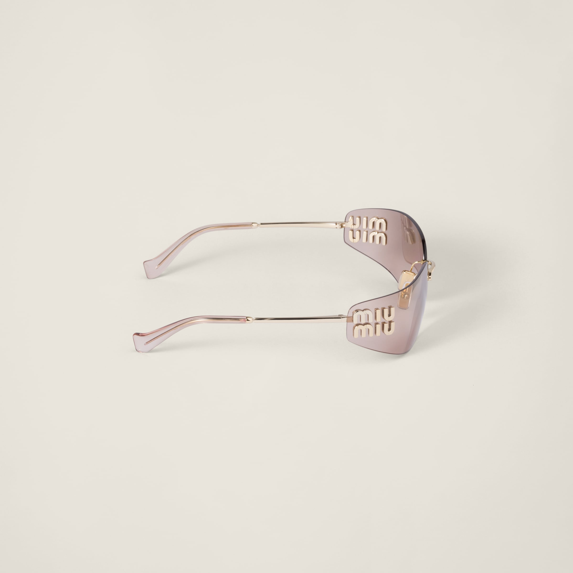 Miu Miu Logo Sunglasses In Bronze Lenses