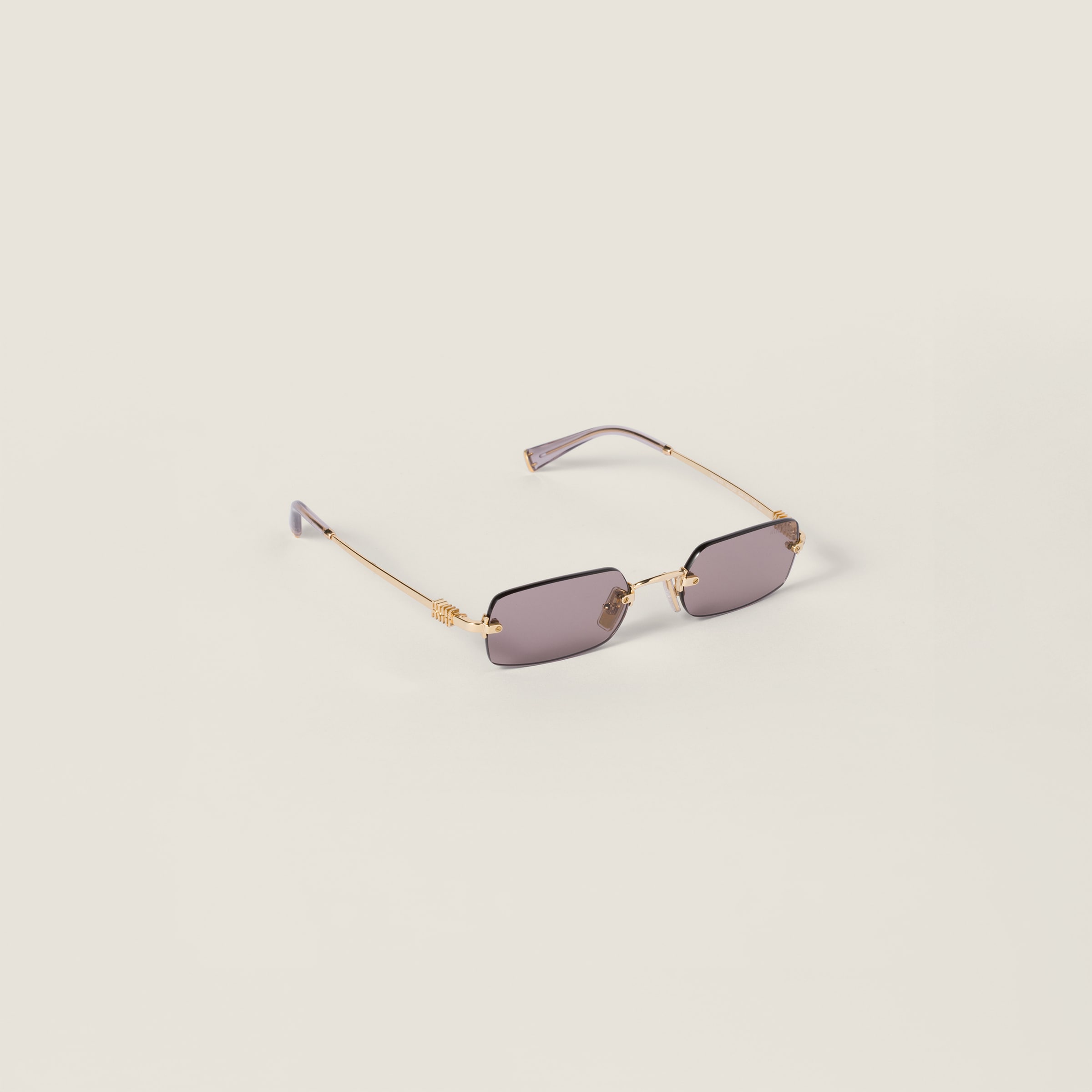مجموعة نظارات شمسية ميو ميو Miu Miu Eyewear عدسات باللون البنفسجي ...