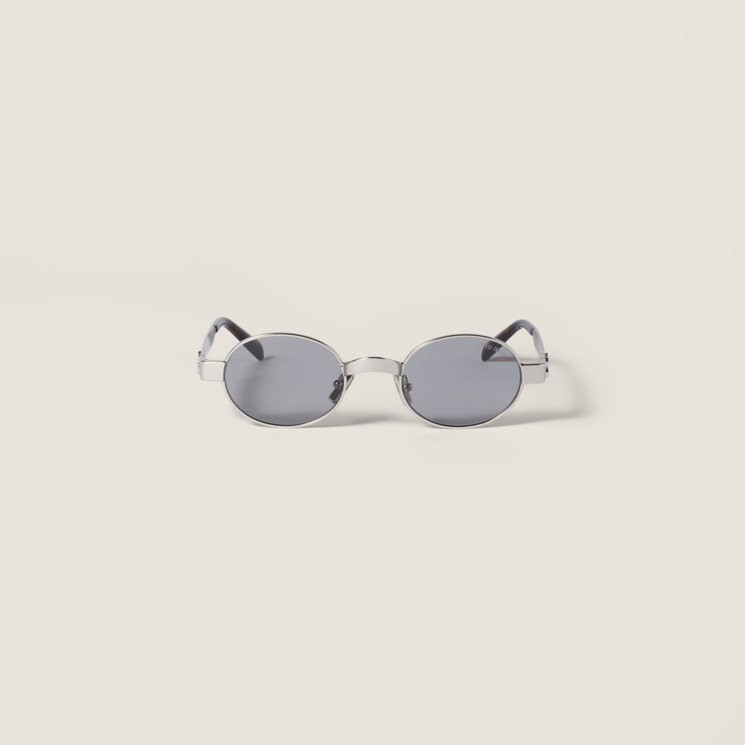 Envie sunglasses from Miu Miu - $570